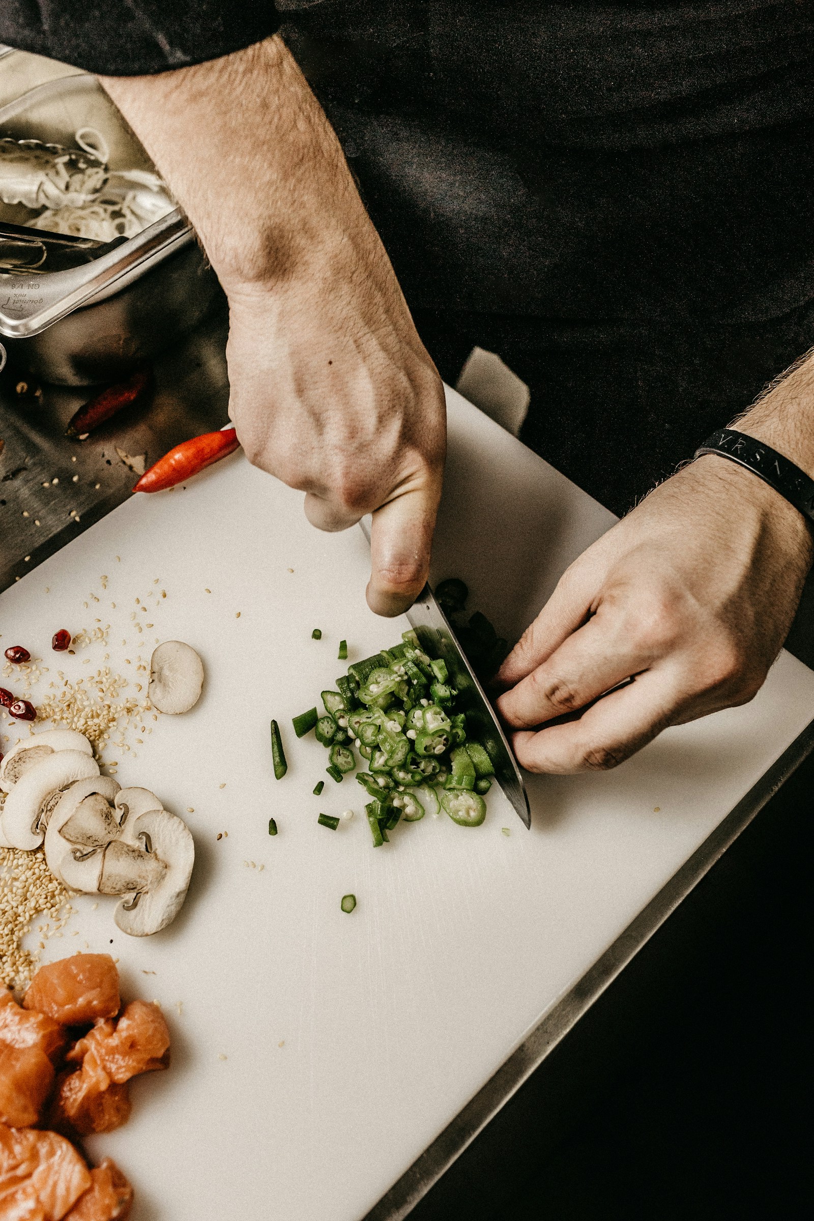Hands plating food
